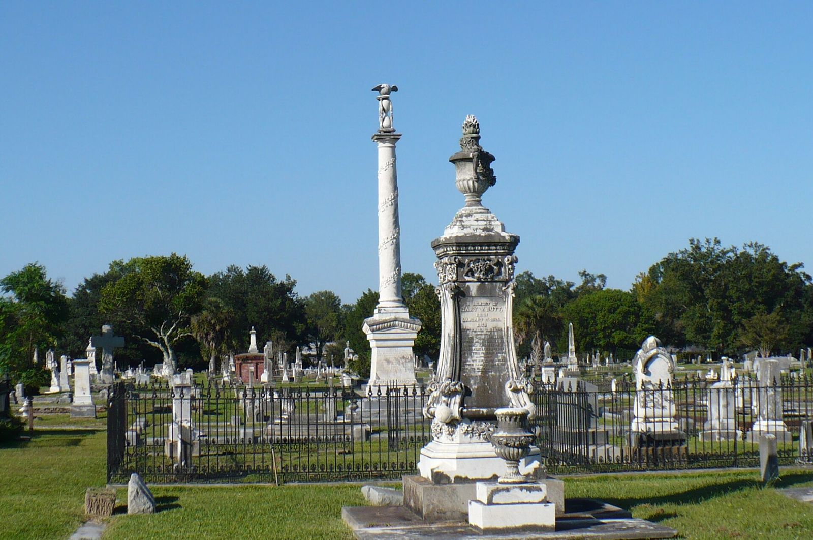 Victorian monuments and cast iron fencing at Magnolia Cemetery